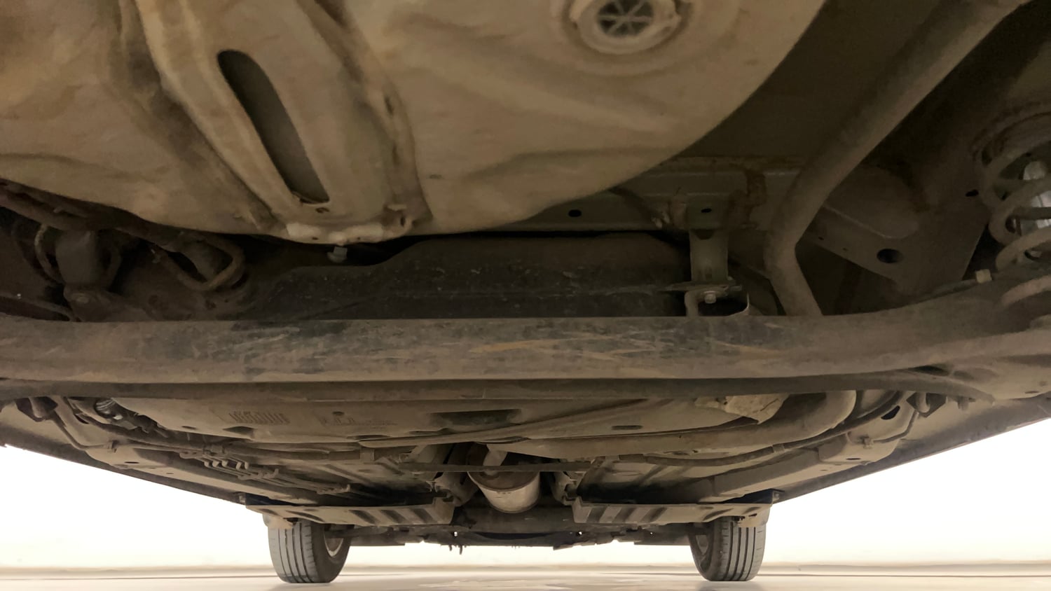 Used 2022 Maruti Suzuki Dzire ZXi CNG Cng Manual extra REAR UNDERBODY VIEW (TAKEN FROM REAR)