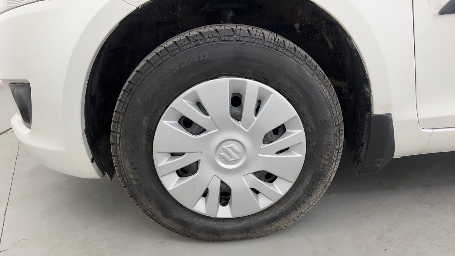 Used 2013 Maruti Suzuki Swift VXi Petrol Manual tyres LEFT FRONT TYRE RIM VIEW