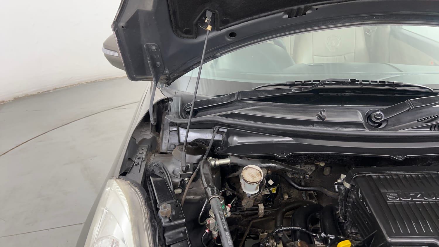 Used 2015 Maruti Suzuki Swift Dzire VXI Petrol Manual engine ENGINE RIGHT SIDE HINGE & APRON VIEW