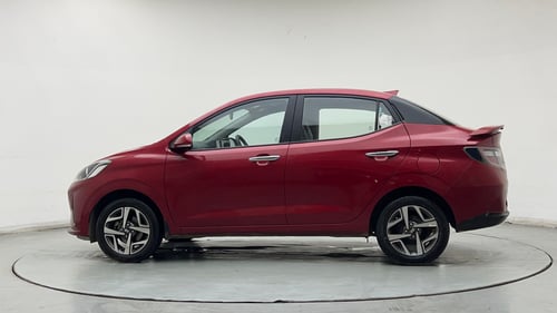 Used 2022 Hyundai Aura SX Plus 1.2 AMT Petrol Petrol Automatic exterior LEFT SIDE VIEW