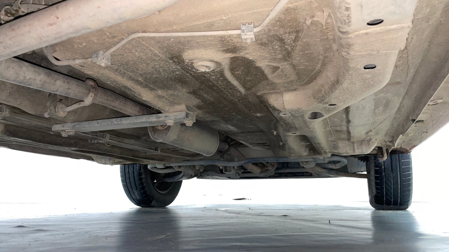 Used 2016 Tata Tiago Revotron XT Petrol Manual extra REAR RIGHT UNDERBODY VIEW
