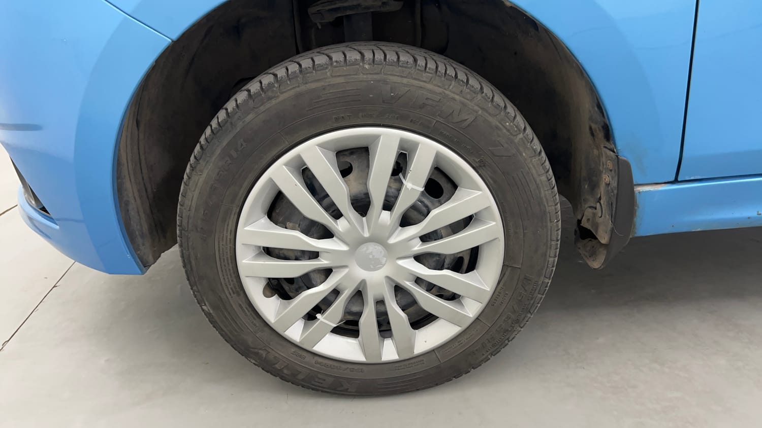 Used 2017 Tata Tiago Revotron XT Petrol Manual tyres LEFT FRONT TYRE RIM VIEW