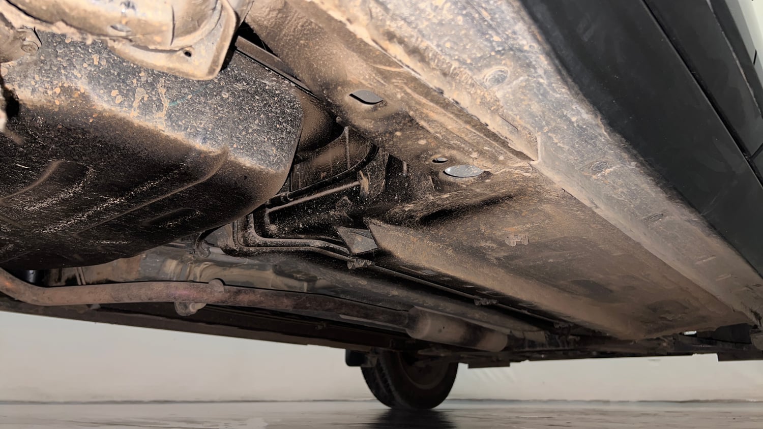 Used 2024 Nissan Magnite XL AMT Petrol Automatic extra REAR RIGHT UNDERBODY VIEW