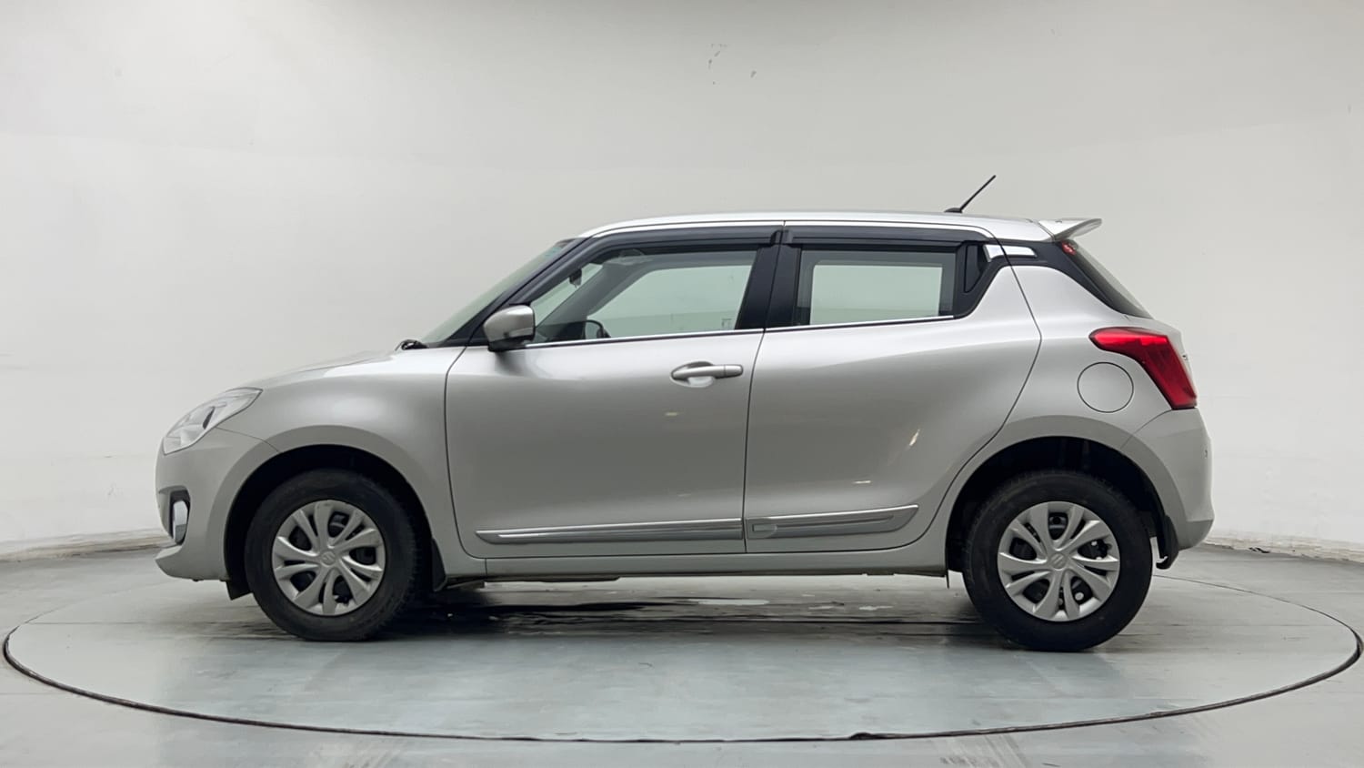 Used 2022 Maruti Suzuki Swift VXi Petrol Manual exterior LEFT SIDE VIEW