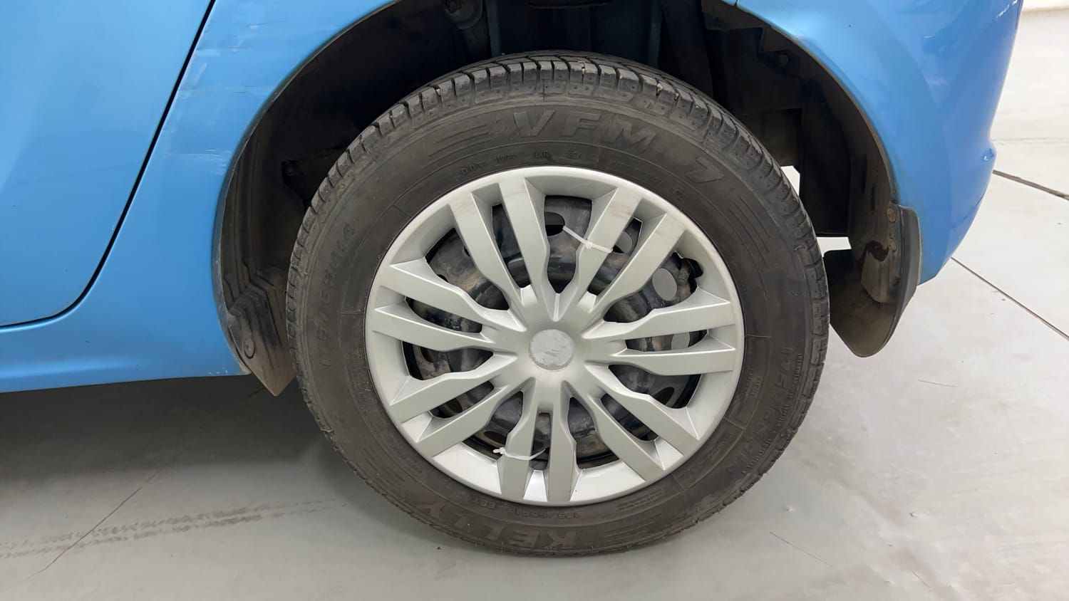 Used 2017 Tata Tiago Revotron XT Petrol Manual tyres LEFT REAR TYRE RIM VIEW