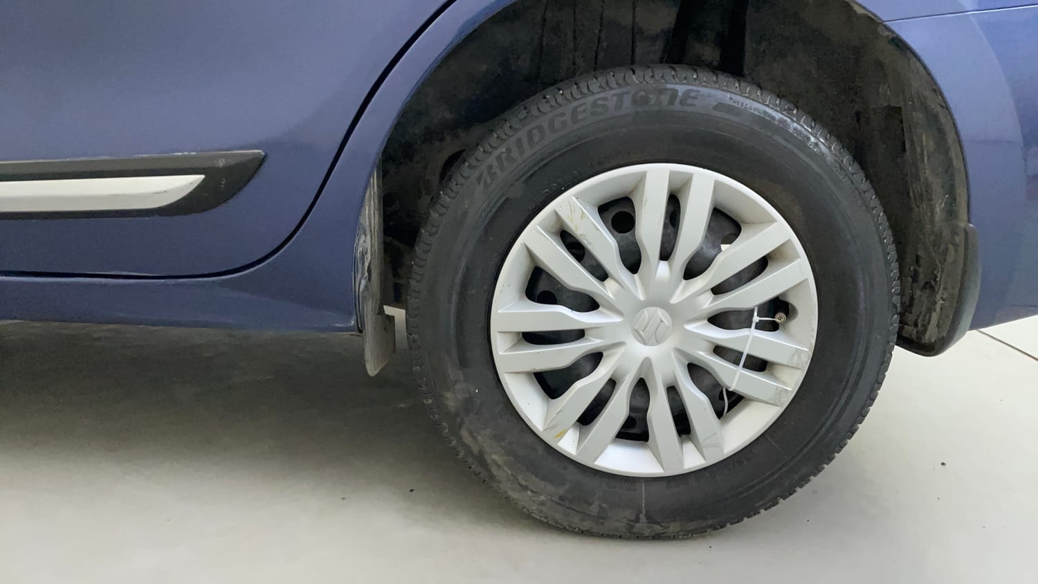 Used 2018 Maruti Suzuki Dzire VXi AMT Petrol Automatic tyres LEFT REAR TYRE RIM VIEW