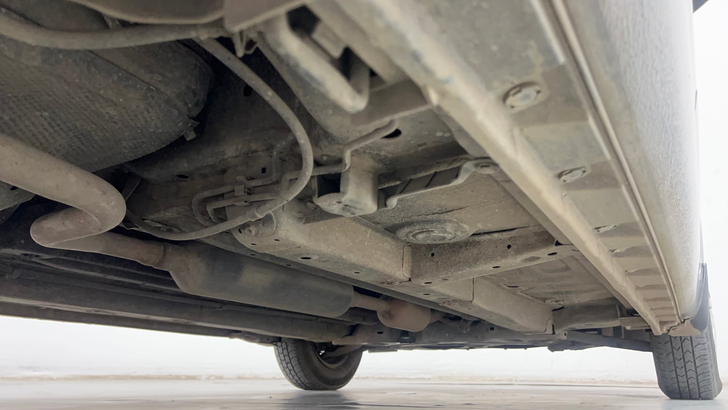 Used 2015 Maruti Suzuki Swift Dzire VXI Petrol Manual extra REAR RIGHT UNDERBODY VIEW