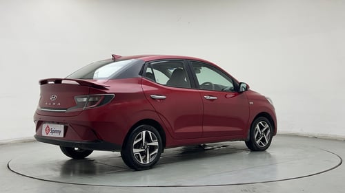 Used 2022 Hyundai Aura SX Plus 1.2 AMT Petrol Petrol Automatic exterior RIGHT REAR CORNER VIEW