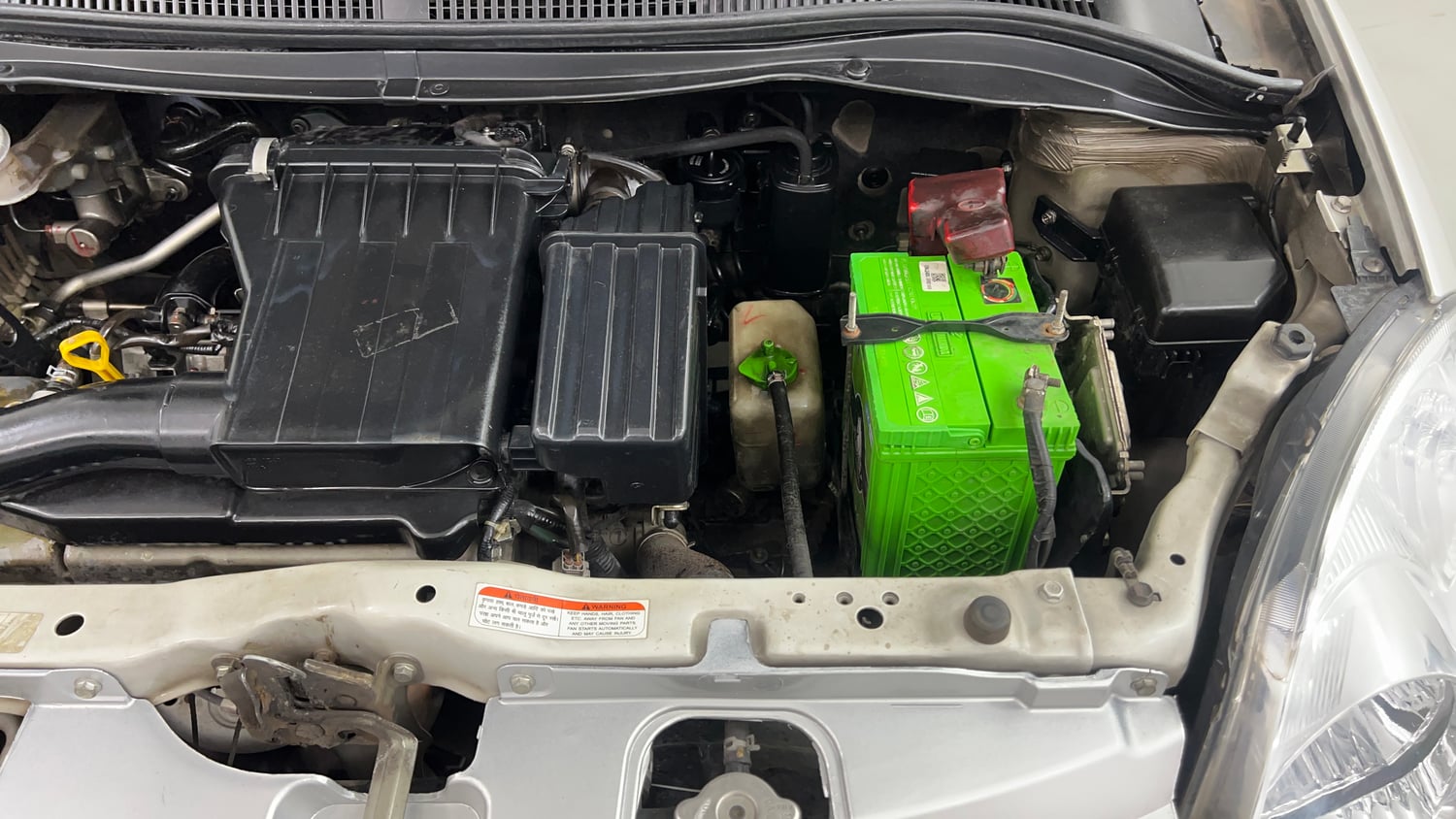 Used 2012 Maruti Suzuki Swift Dzire ZXi 1.2 BS-IV Petrol Manual engine ENGINE LEFT SIDE VIEW