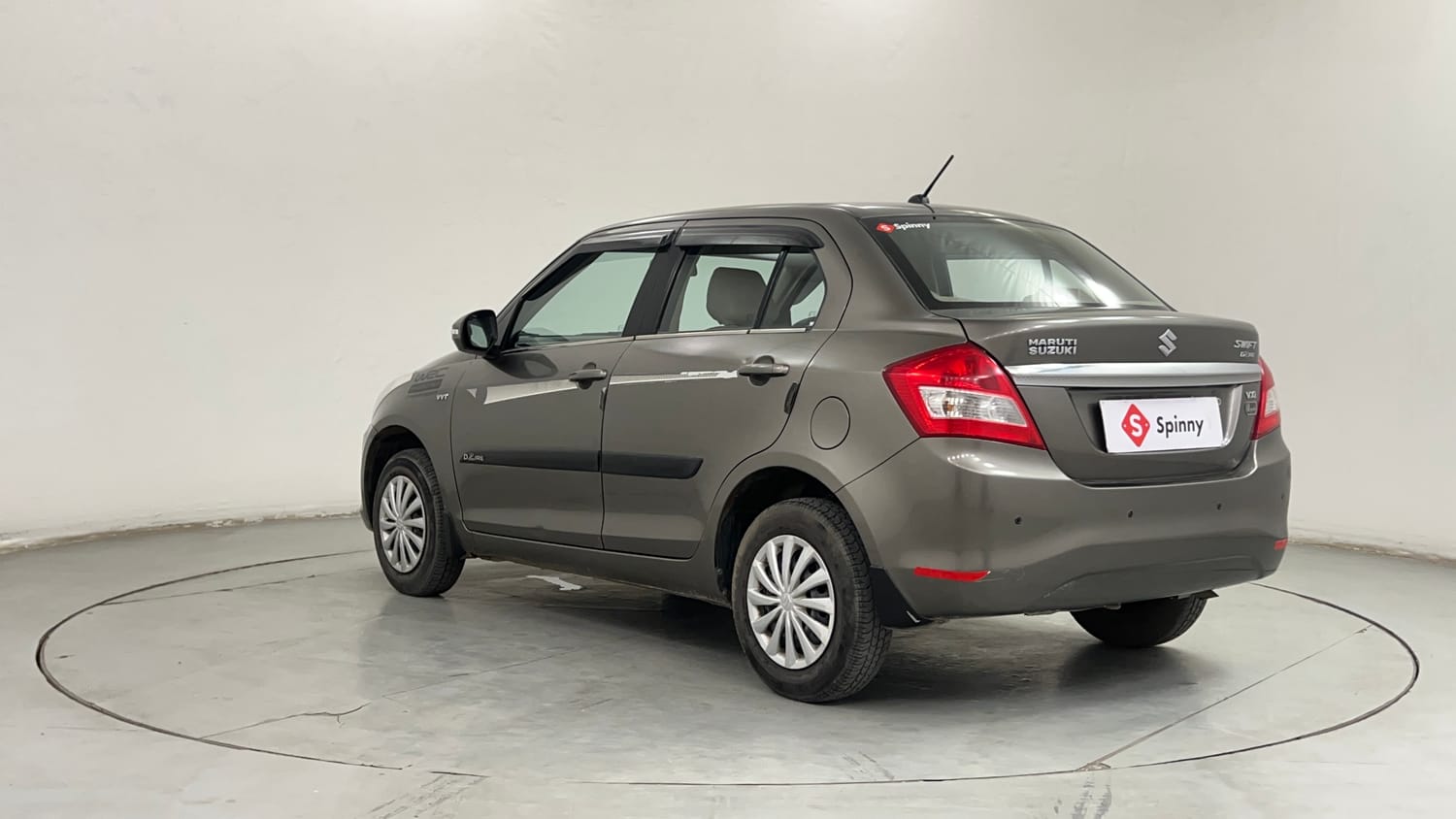 Used 2015 Maruti Suzuki Swift Dzire VXI Petrol Manual exterior LEFT REAR CORNER VIEW