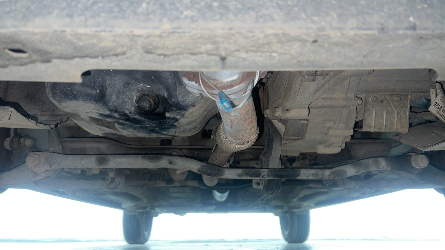 Used 2021 Tata Tigor XZA Plus Petrol Automatic extra FRONT LEFT UNDERBODY VIEW