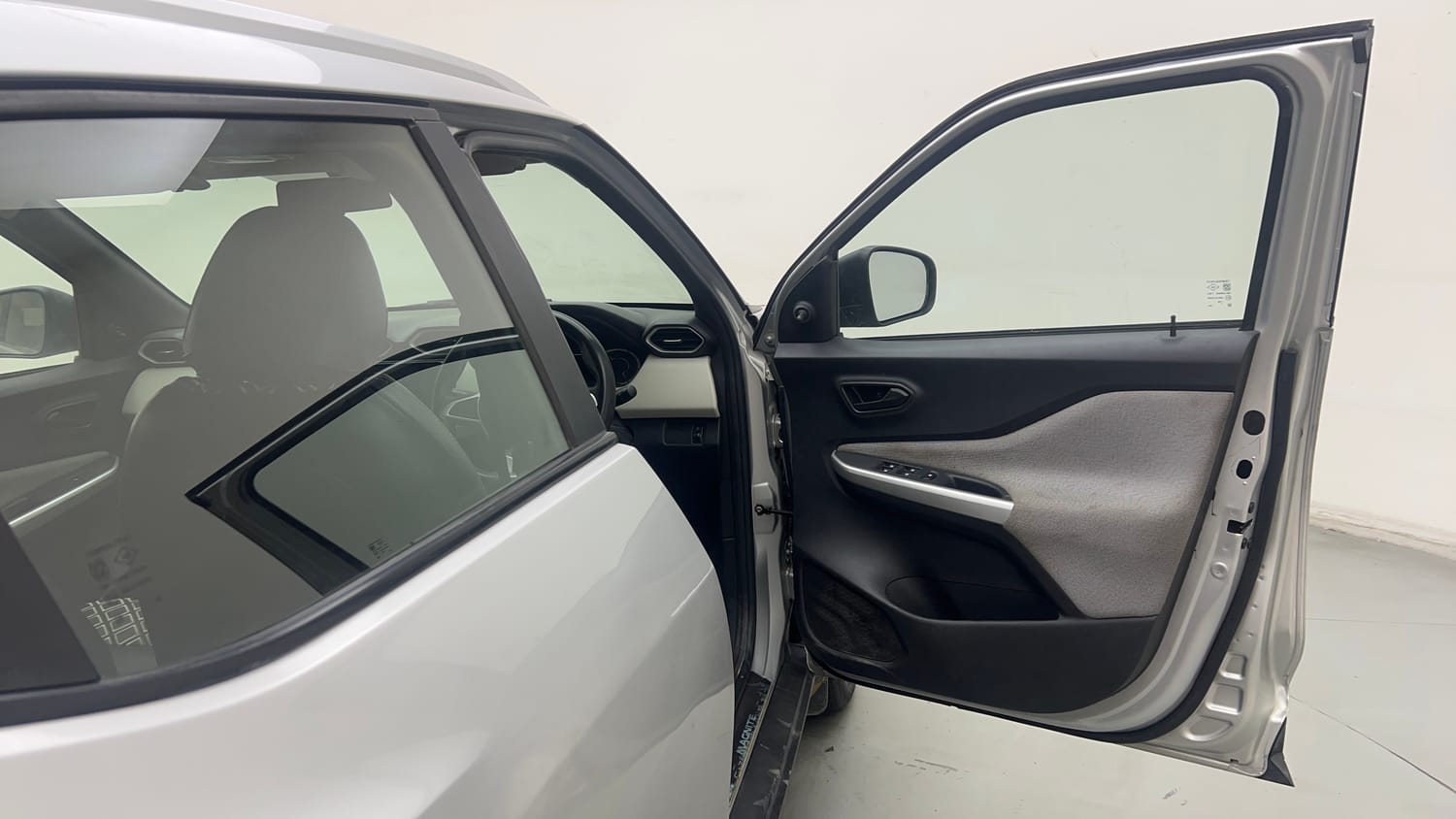 Used 2021 Nissan Magnite XE Petrol Manual interior RIGHT FRONT DOOR OPEN VIEW