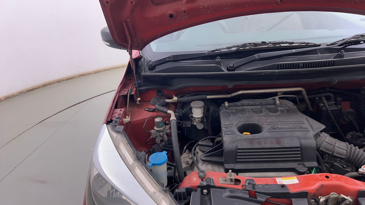 Used 2017 Maruti Suzuki Celerio VXi AMT Petrol Automatic engine ENGINE RIGHT SIDE HINGE & APRON VIEW