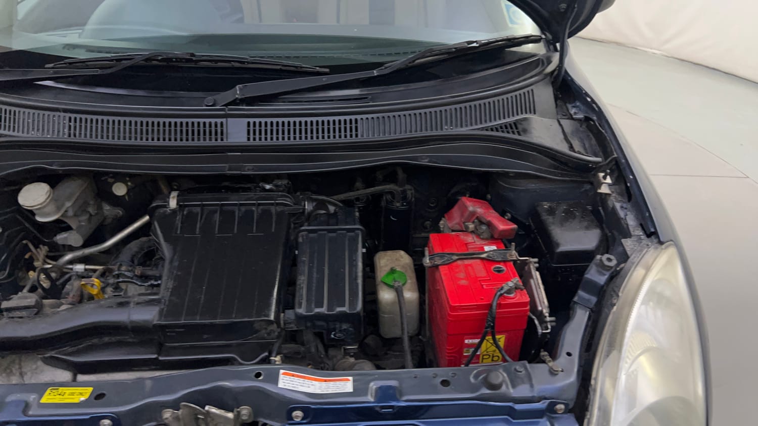 Used 2012 Maruti Suzuki Swift Dzire LXi 1.2 BS-IV Petrol Manual engine ENGINE LEFT SIDE HINGE & APRON VIEW