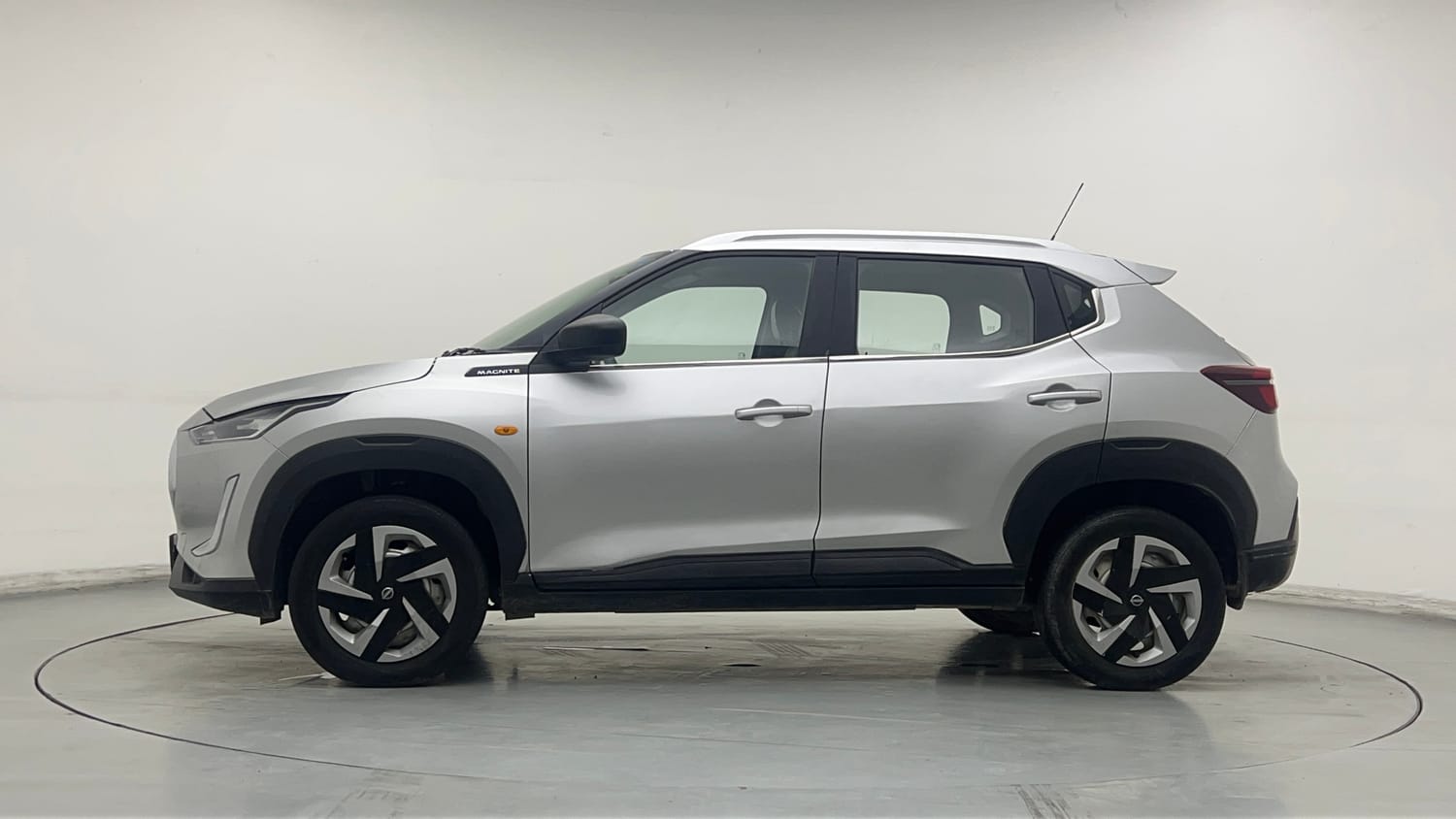 Used 2021 Nissan Magnite XE Petrol Manual exterior LEFT SIDE VIEW