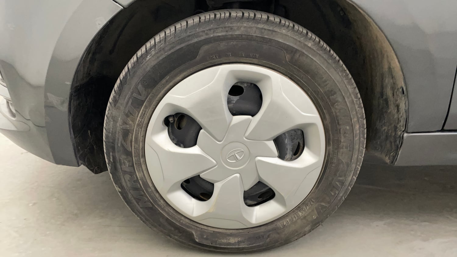 Used 2023 Tata Tiago XT (O) Petrol Manual tyres LEFT FRONT TYRE RIM VIEW