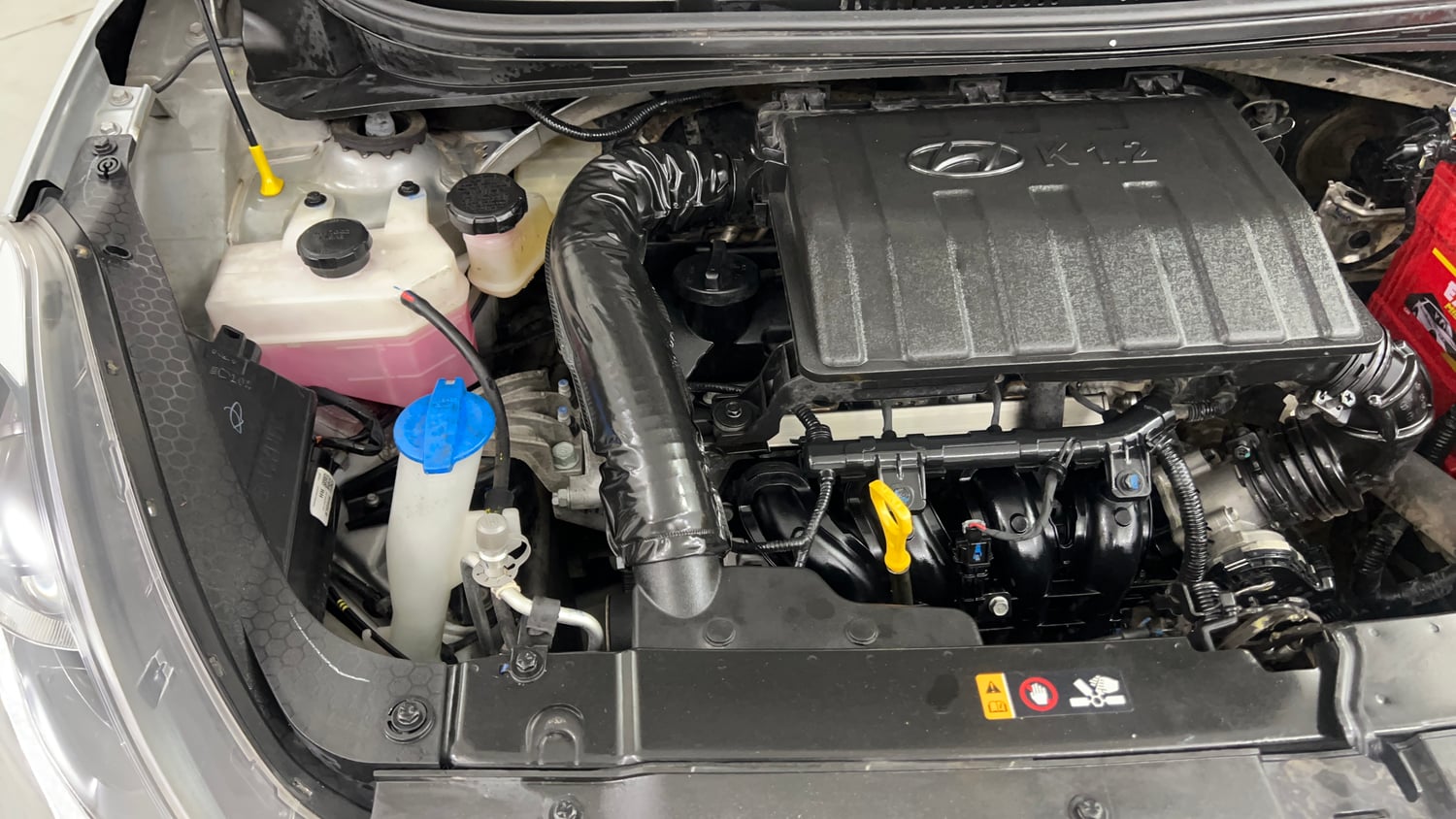 Used 2021 Hyundai Grand i10 Nios Sportz AMT 1.2 Kappa VTVT Petrol Automatic engine ENGINE RIGHT SIDE VIEW