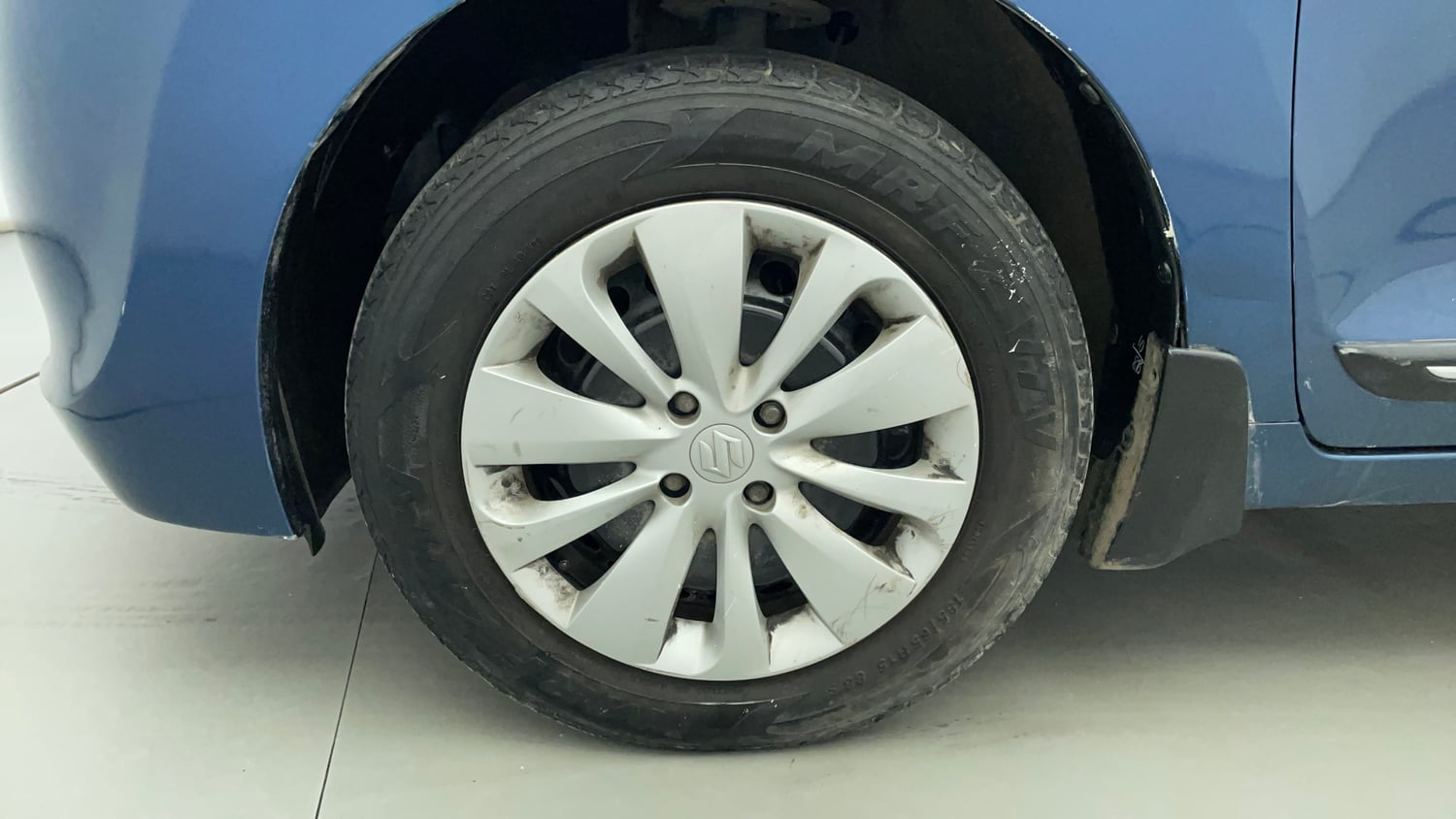 Used 2017 Maruti Suzuki Baleno Delta 1.2 Petrol Manual tyres LEFT FRONT TYRE RIM VIEW
