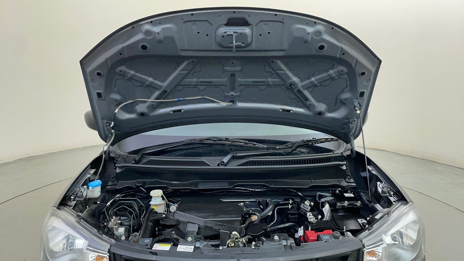 Used 2025 Maruti Suzuki S-Presso VXi (O) Petrol Manual engine ENGINE & BONNET OPEN FRONT VIEW