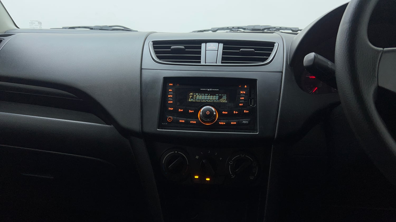 Used 2014 Maruti Suzuki Swift LXi Petrol Manual interior MUSIC SYSTEM & AC CONTROL VIEW