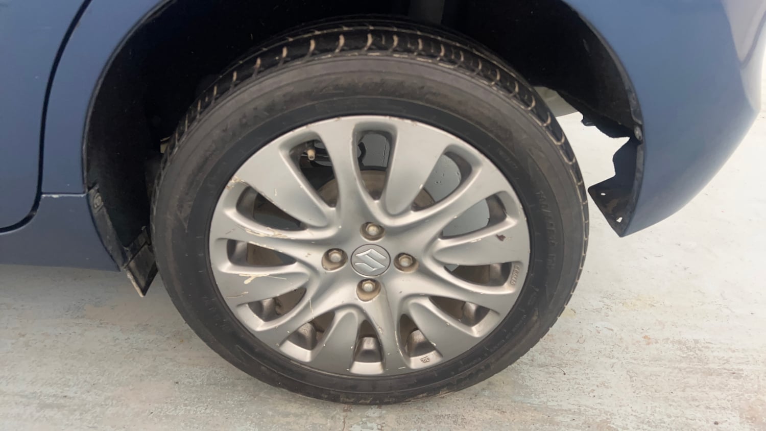 Used 2017 Maruti Suzuki Baleno Zeta 1.3 Diesel Manual tyres LEFT REAR TYRE RIM VIEW