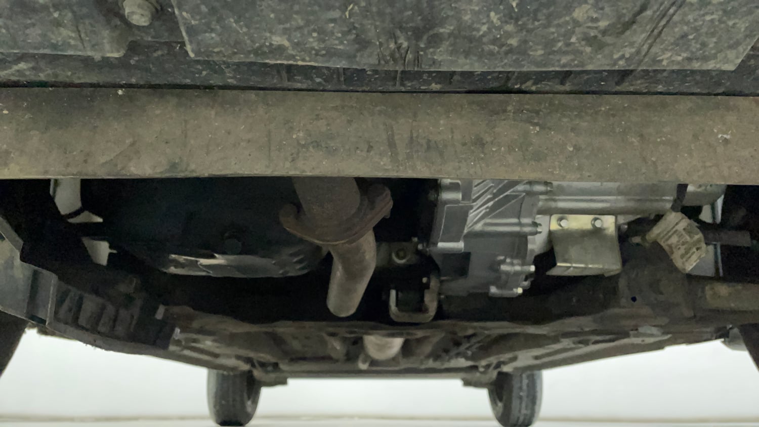 Used 2023 Tata Punch Camo Adventure Rhythm AMT Petrol Automatic extra FRONT LEFT UNDERBODY VIEW