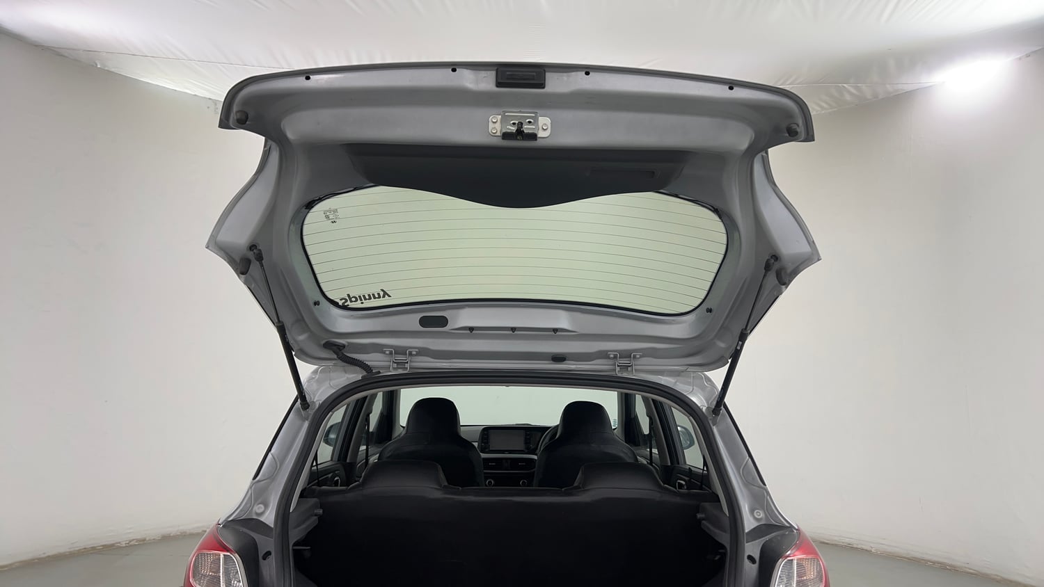 Used 2021 Hyundai Grand i10 Nios Sportz AMT 1.2 Kappa VTVT Petrol Automatic interior DICKY DOOR OPEN VIEW