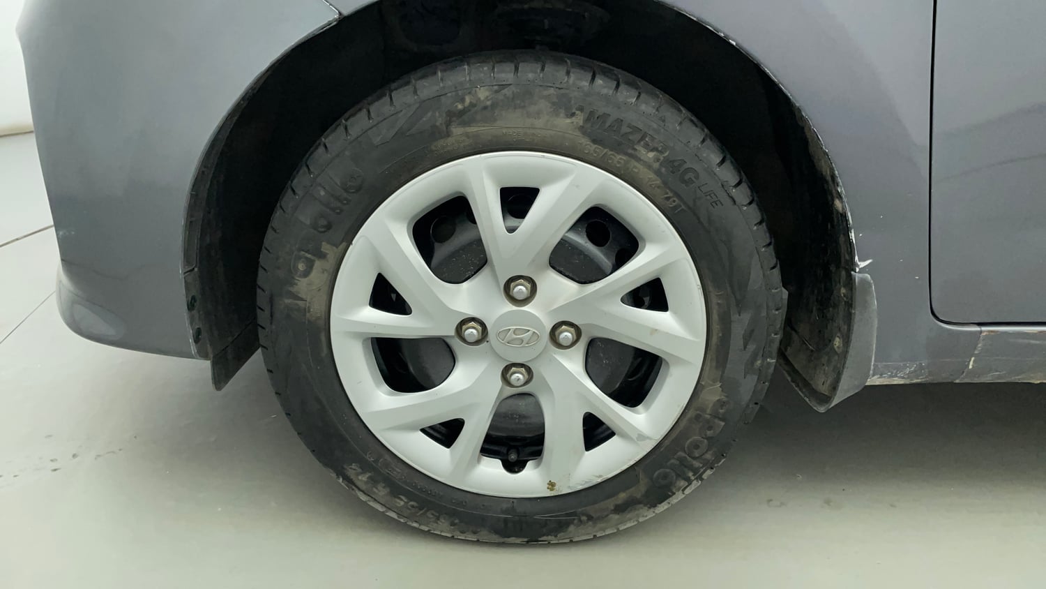 Used 2018 Hyundai Grand i10 Magna 1.2 Kappa VTVT Petrol Manual tyres LEFT FRONT TYRE RIM VIEW