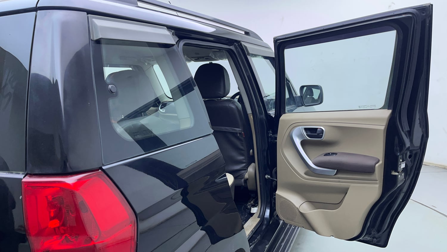 Used 2016 Mahindra TUV300 T8 Diesel Manual interior RIGHT REAR DOOR OPEN VIEW