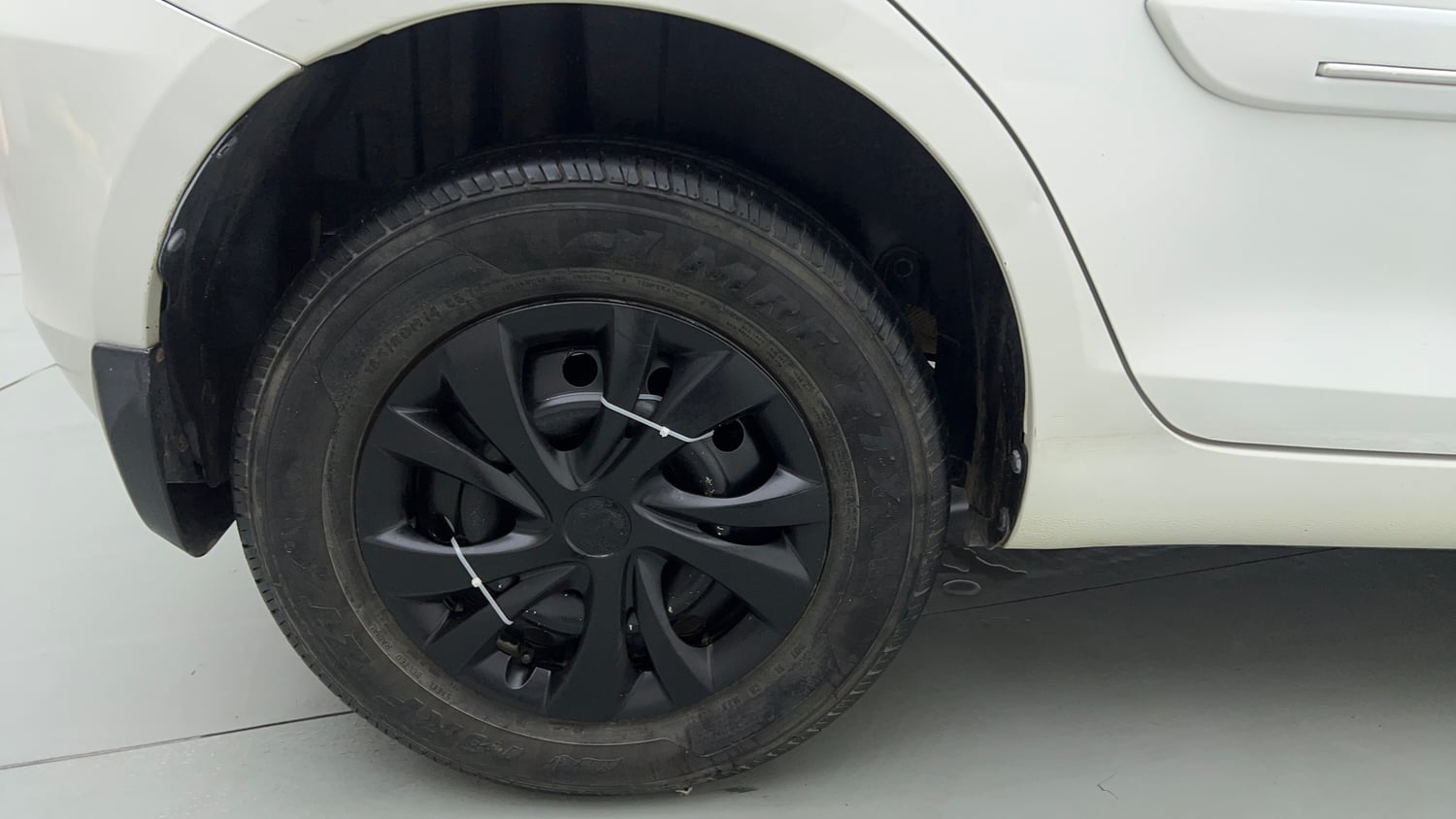 Used 2014 Maruti Suzuki Swift LXi Petrol Manual tyres RIGHT REAR TYRE RIM VIEW