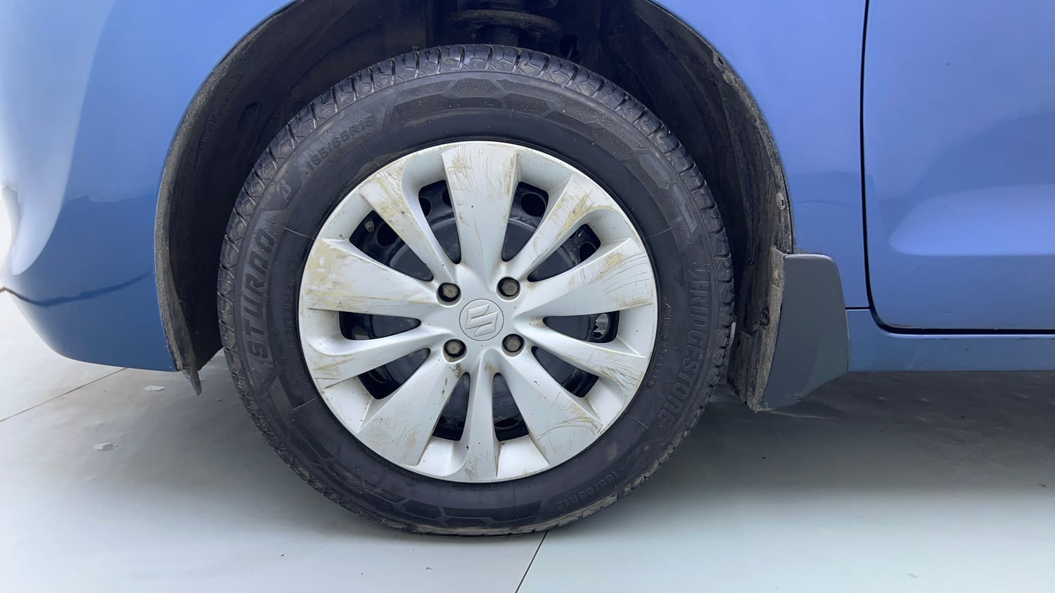 Used 2018 Maruti Suzuki Baleno Delta 1.2 Petrol Manual tyres LEFT FRONT TYRE RIM VIEW