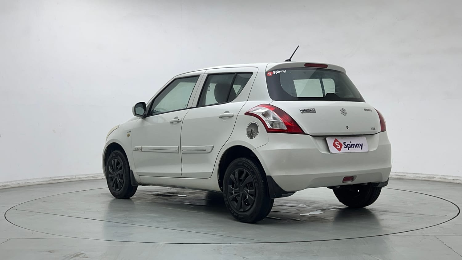 Used 2014 Maruti Suzuki Swift LXi Petrol Manual exterior LEFT REAR CORNER VIEW