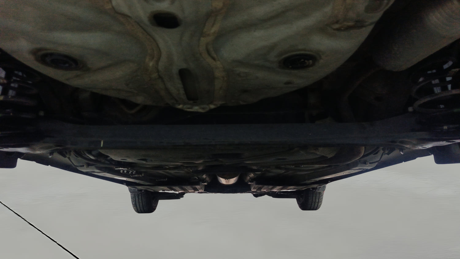 Used 2022 Maruti Suzuki Swift VXi AMT Petrol Automatic extra REAR UNDERBODY VIEW (TAKEN FROM REAR)