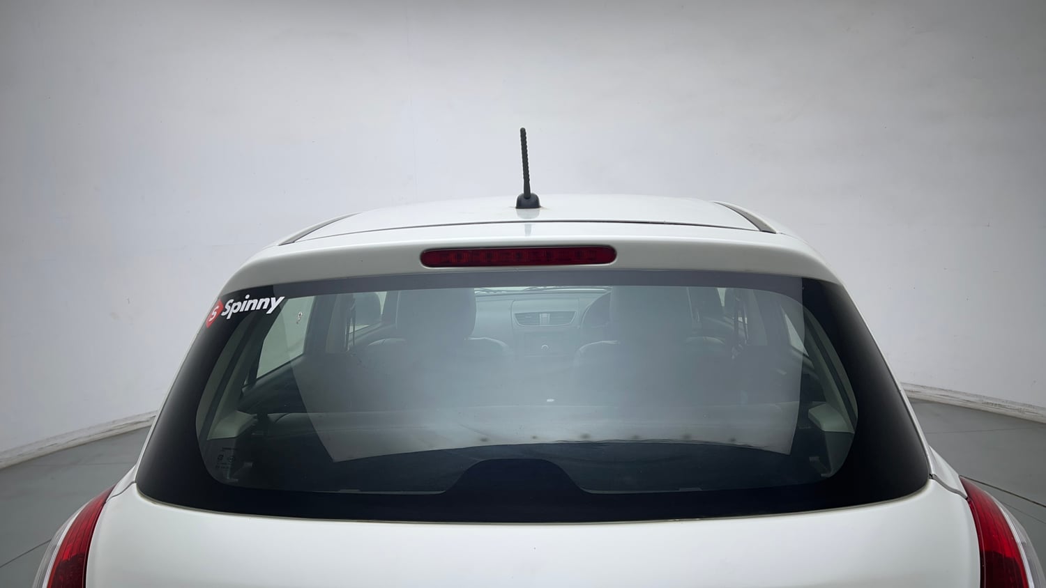 Used 2014 Maruti Suzuki Swift LXi Petrol Manual exterior BACK WINDSHIELD VIEW