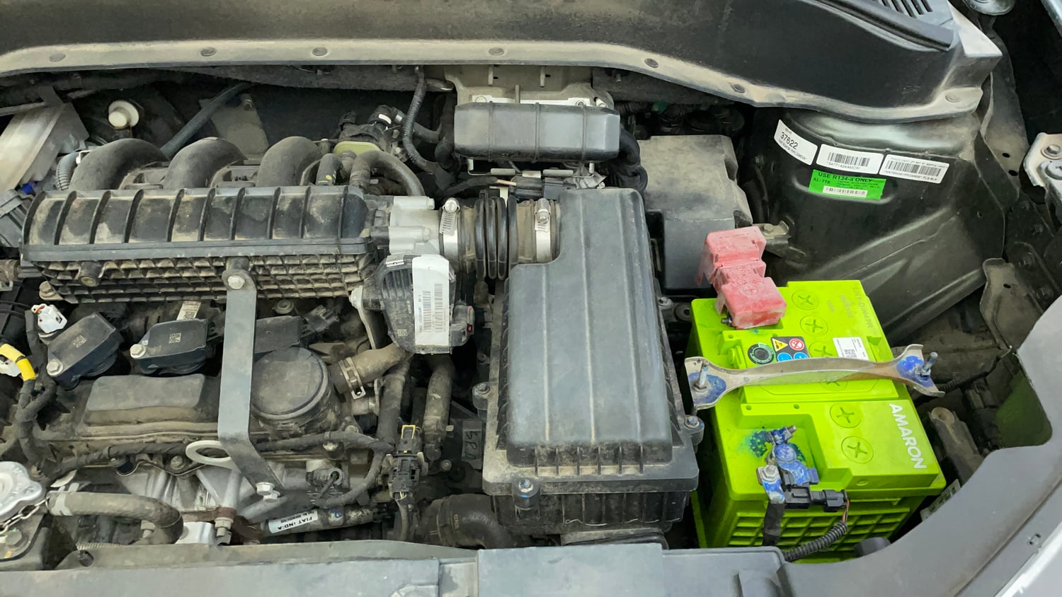 Used 2023 Tata Punch Camo Adventure Rhythm AMT Petrol Automatic engine ENGINE LEFT SIDE VIEW