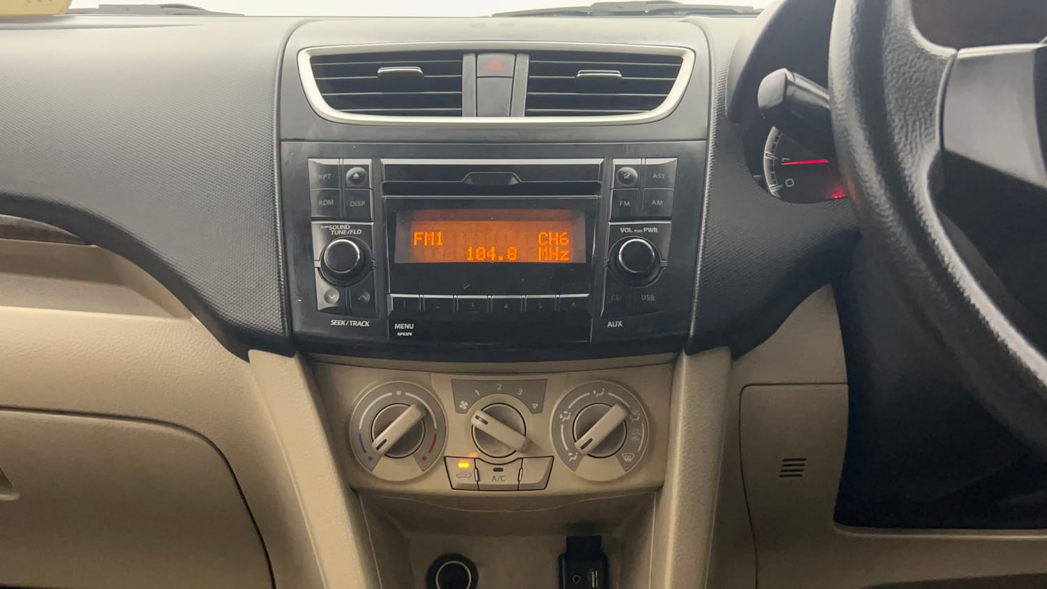 Used 2015 Maruti Suzuki Swift Dzire VXI Petrol Manual top_features Integrated (in-dash) music system