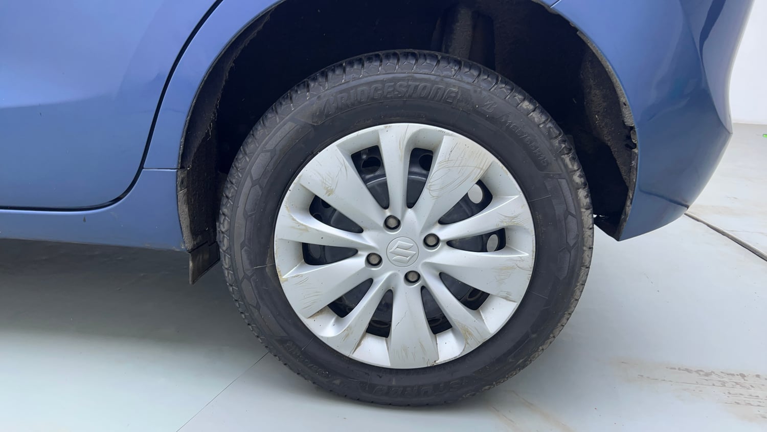 Used 2018 Maruti Suzuki Baleno Delta 1.2 Petrol Manual tyres LEFT REAR TYRE RIM VIEW