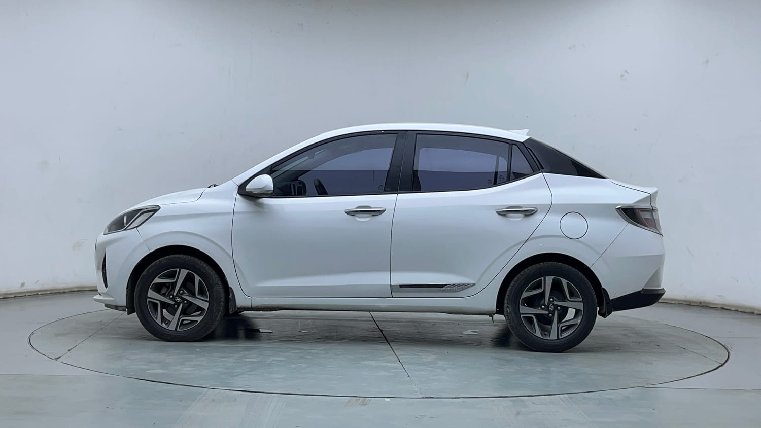 Used 2021 Hyundai Aura SX Plus 1.2 AMT Petrol Petrol Automatic exterior LEFT SIDE VIEW