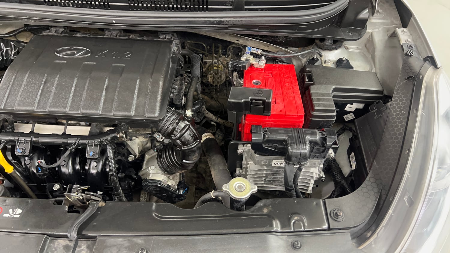 Used 2021 Hyundai Grand i10 Nios Sportz AMT 1.2 Kappa VTVT Petrol Automatic engine ENGINE LEFT SIDE VIEW