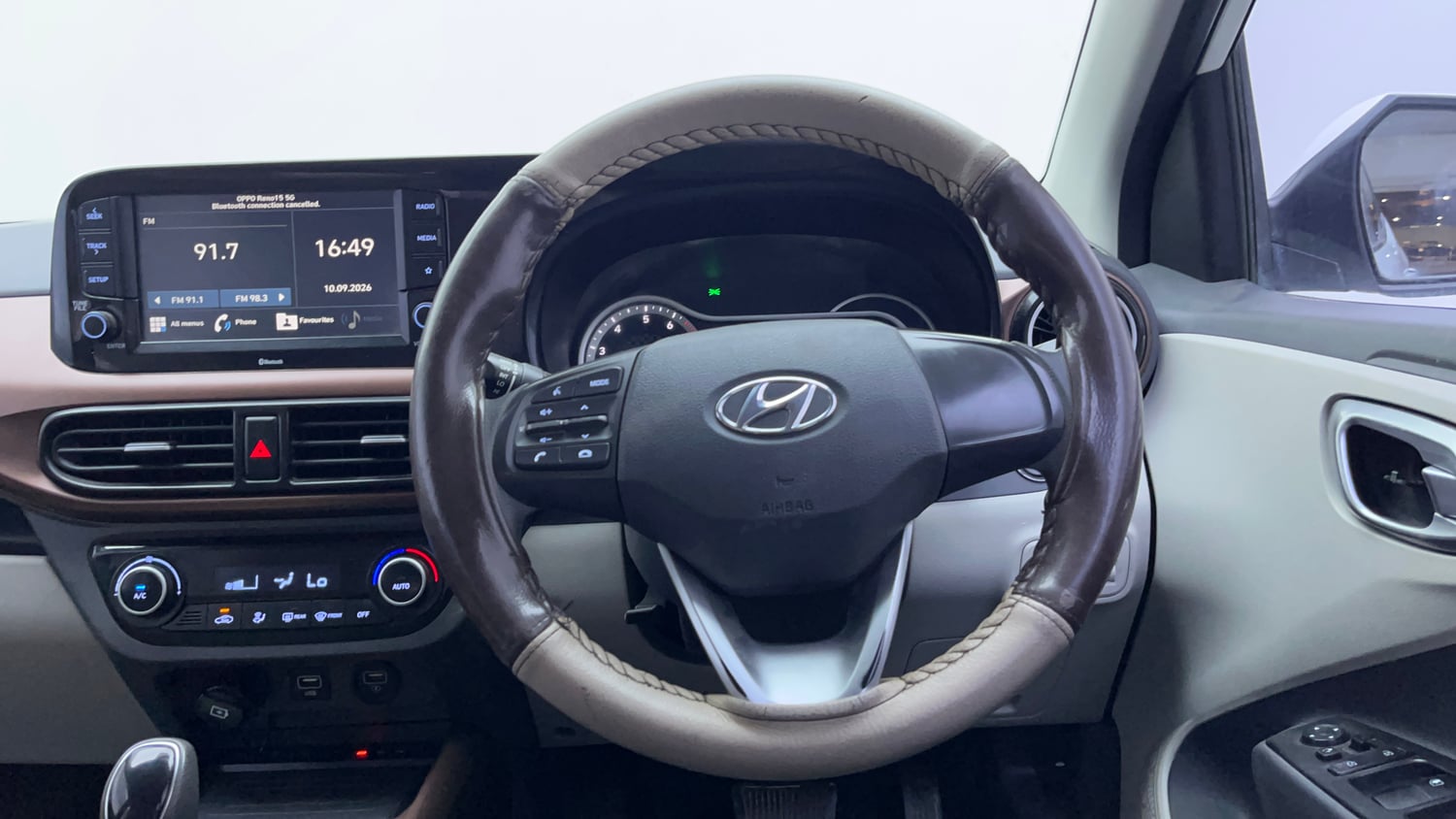 Used 2021 Hyundai Aura SX Plus 1.2 AMT Petrol Petrol Automatic interior STEERING VIEW