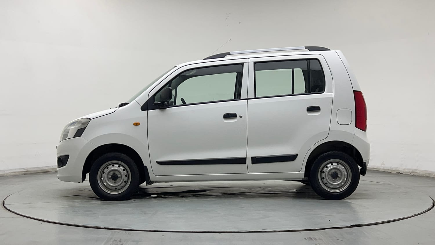 Used 2013 Maruti Suzuki Wagon R LXI Petrol Manual exterior LEFT SIDE VIEW