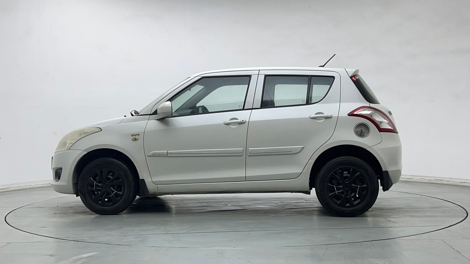 Used 2014 Maruti Suzuki Swift LXi Petrol Manual exterior LEFT SIDE VIEW
