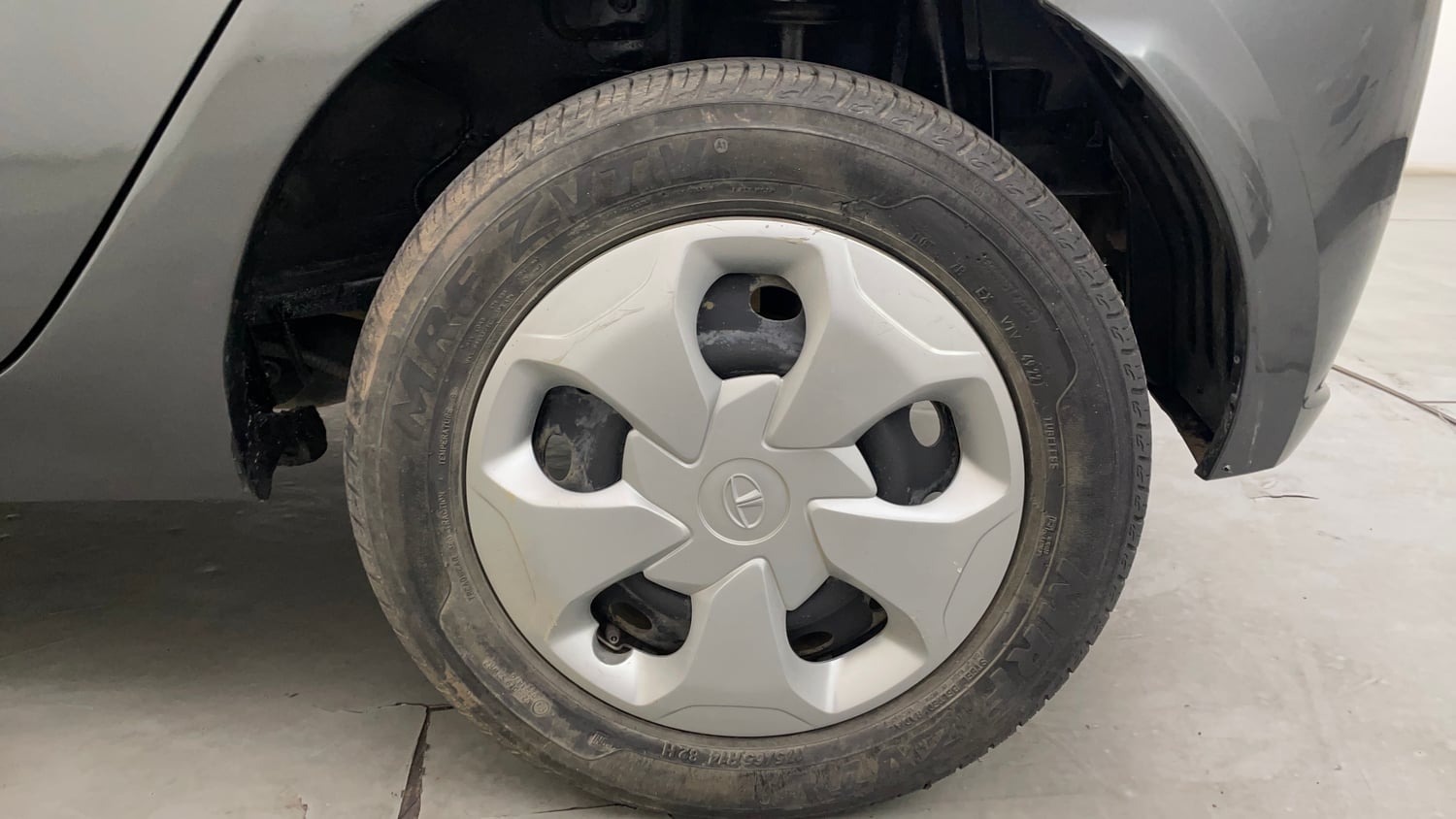 Used 2023 Tata Tiago XT (O) Petrol Manual tyres LEFT REAR TYRE RIM VIEW
