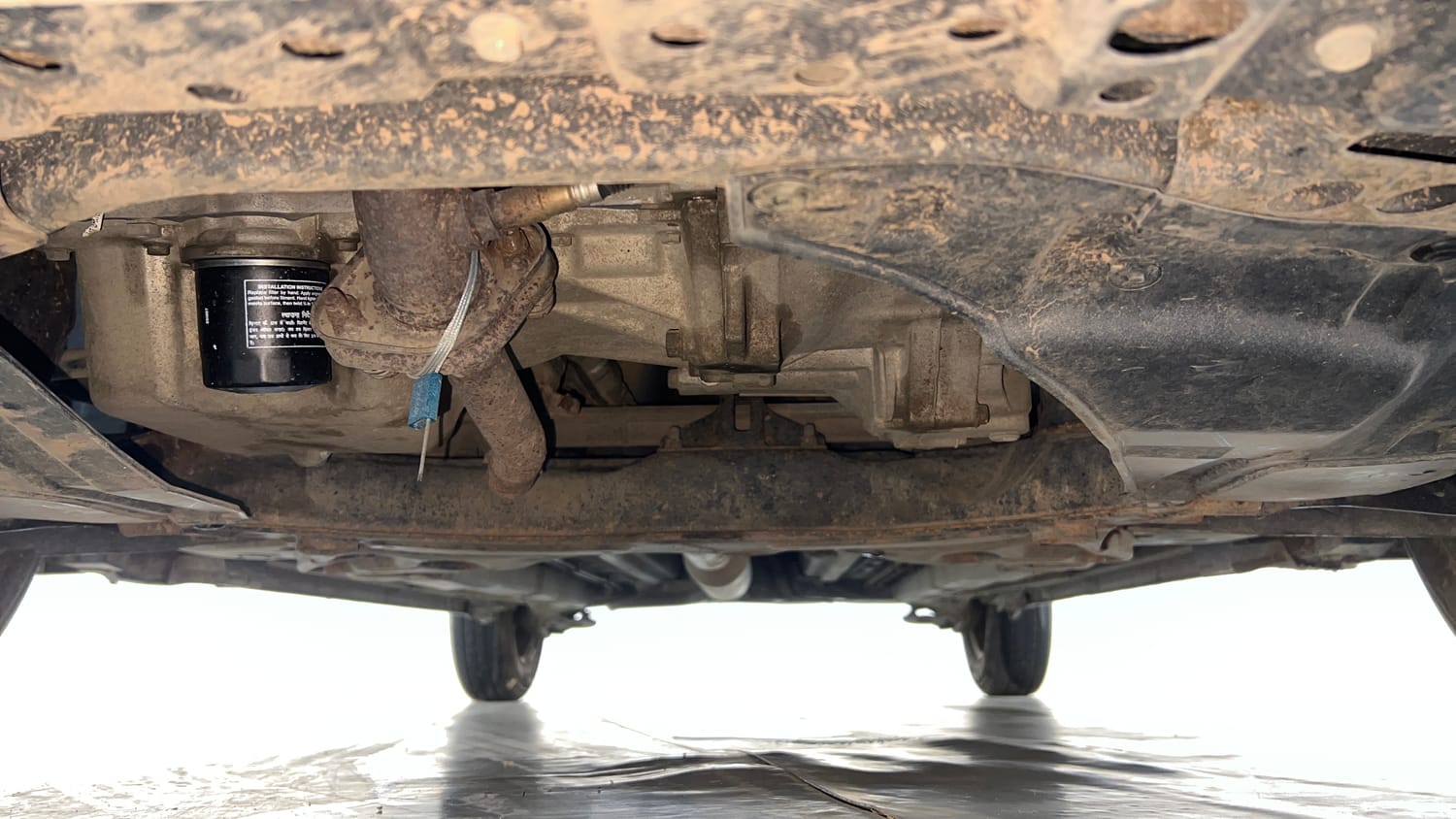 Used 2014 Maruti Suzuki Swift LXi Petrol Manual extra FRONT LEFT UNDERBODY VIEW