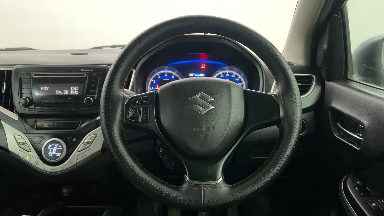 Used 2017 Maruti Suzuki Baleno Zeta 1.2 Petrol Manual interior STEERING VIEW