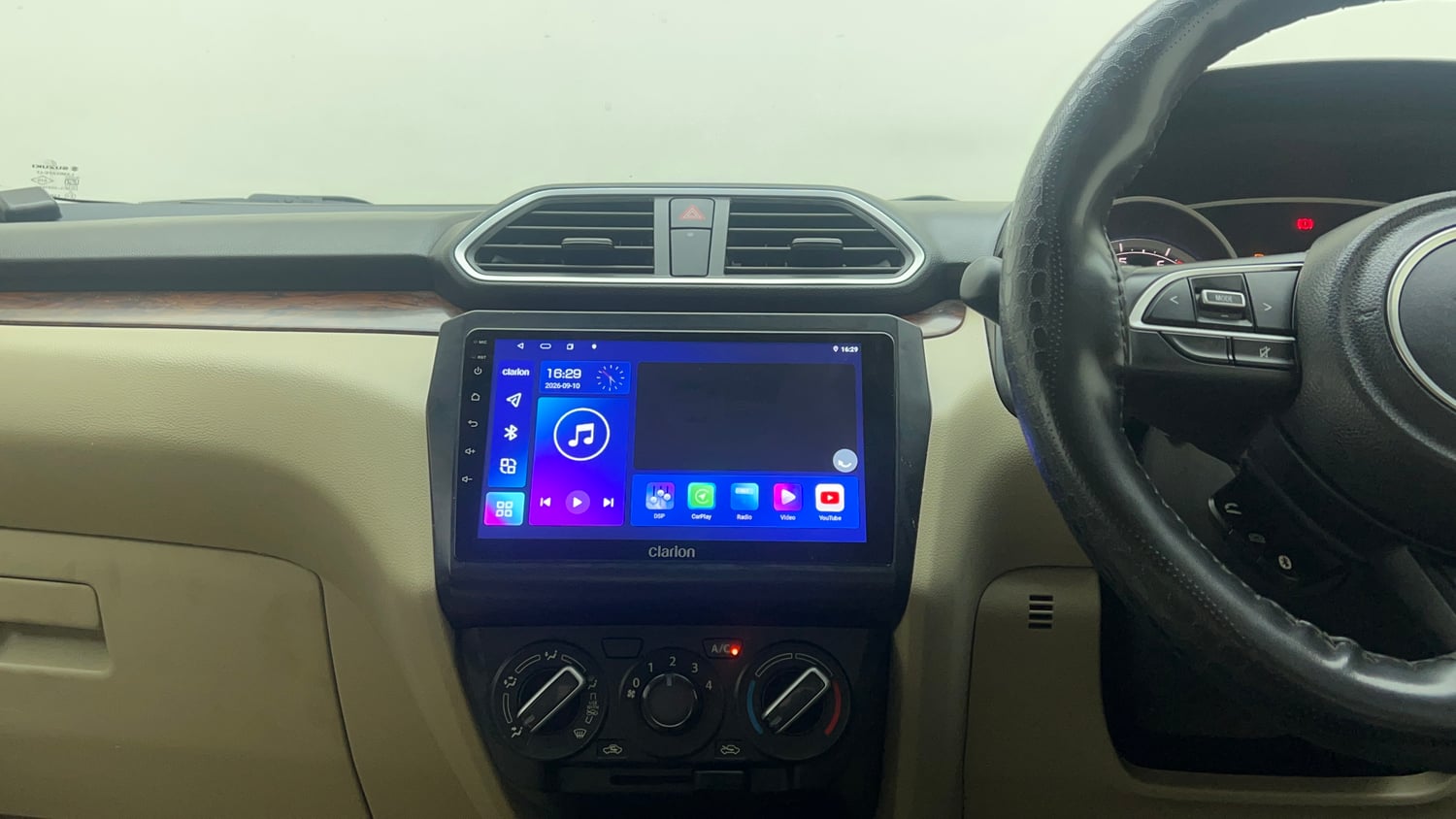 Used 2019 Maruti Suzuki Dzire VXi Petrol Manual top_features Integrated (in-dash) music system