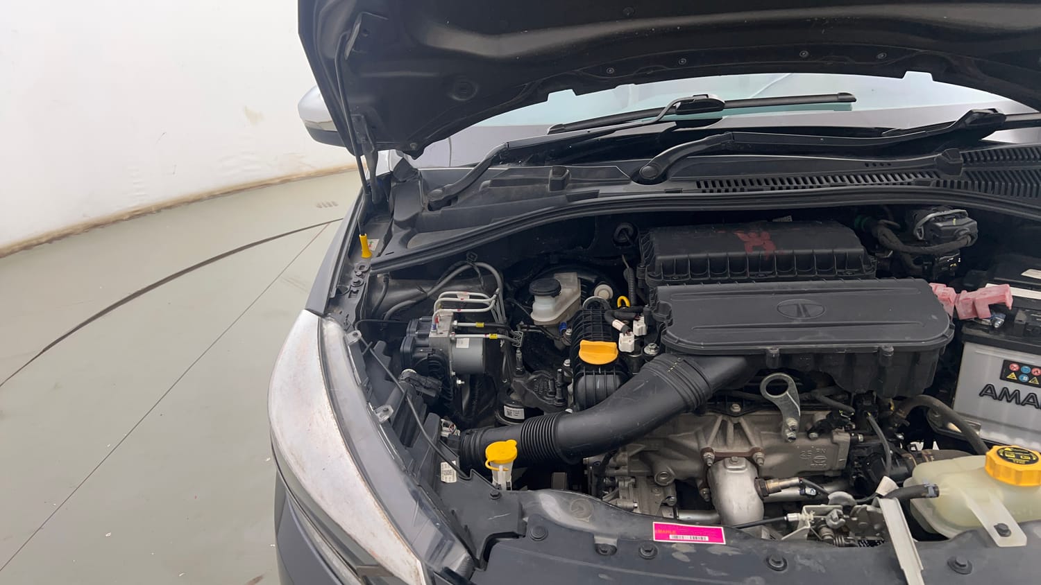 Used 2025 Tata Tiago XZ Plus Petrol Manual engine ENGINE RIGHT SIDE HINGE & APRON VIEW