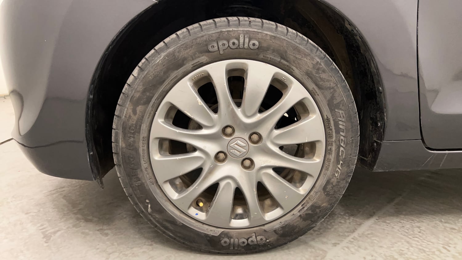 Used 2017 Maruti Suzuki Baleno Zeta 1.2 Petrol Manual tyres LEFT FRONT TYRE RIM VIEW