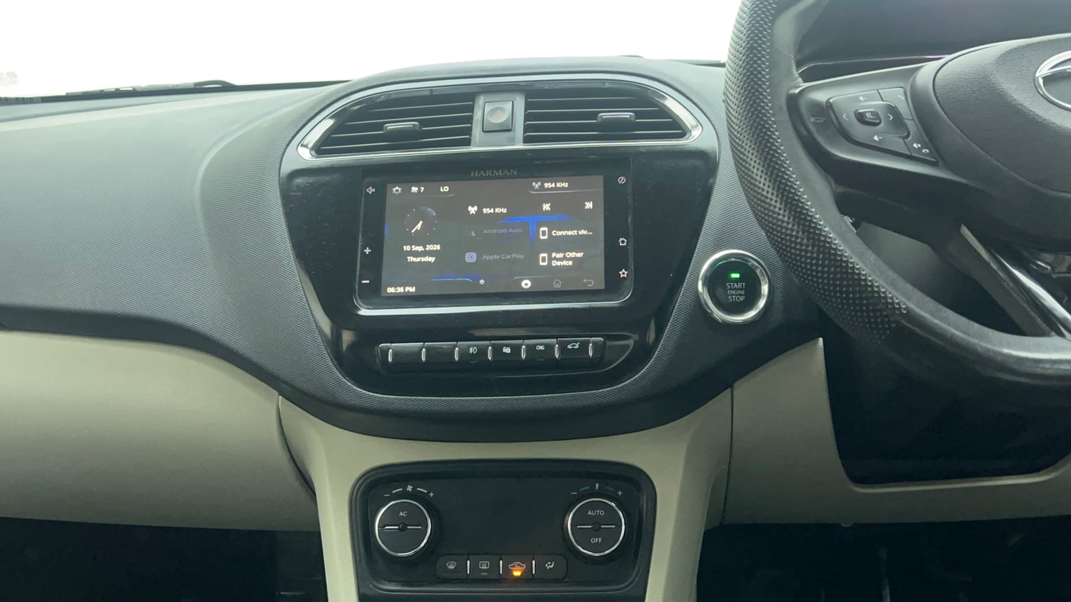Used 2022 Tata Tigor XZ Plus CNG Cng Manual top_features Integrated (in-dash) music system