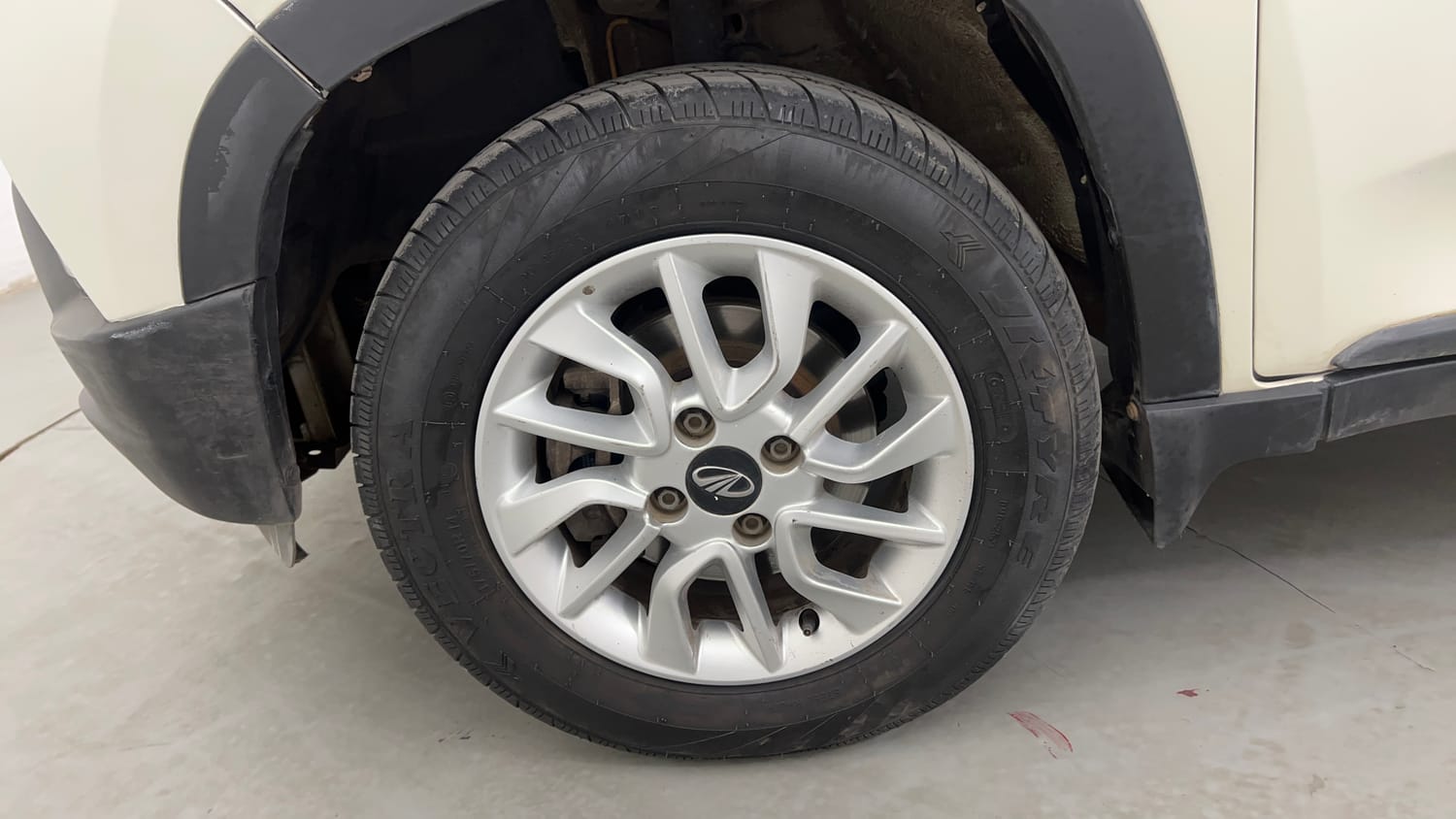 Used 2016 Mahindra KUV100 K8 6 STR Petrol Manual tyres LEFT FRONT TYRE RIM VIEW